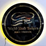 2D Black & Golden Business Logo With Glowing Light